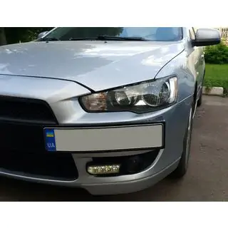 Numura zīmes turētājs (plastmasa) Mitsubishi Lancer X 2008– foto 2