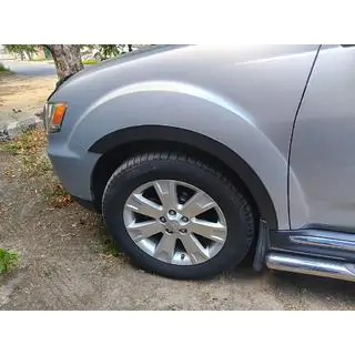 Riteņu arku uzlikas (4 gab., melnas) Mitsubishi Outlander 2006–2012 foto 2