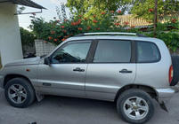 Chevrolet Niva 1998–2020 Hromēti jumta reliņi foto 2