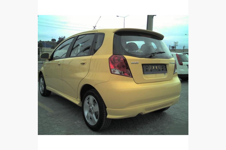 Chevrolet Aveo T200 2002–2008 Aizmugurējā bampera uzlika (krāsošanai) Image