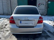 Chevrolet Aveo T250 2005–2011 Aizmugurējā bampera uzlika ar ieloku, plastmasa Matēts, sedans (4 durvis) foto 1