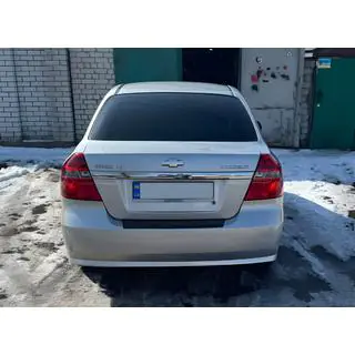 Aizmugurējā bampera uzlika ar ieloku, plastmasa Chevrolet Aveo T250 2005–2011 foto 1
