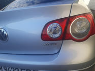 Volkswagen Passat B6 2006–2012 Uzraksts 2.0 TDI (ar sarkanu I) foto 2