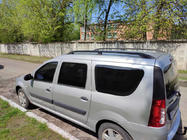 Lada Largus 2012– Melni jumta reliņi foto 1