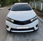 Toyota Corolla 2013–2019 Priekšējā bufera lūpas uzlika (melna) foto 2