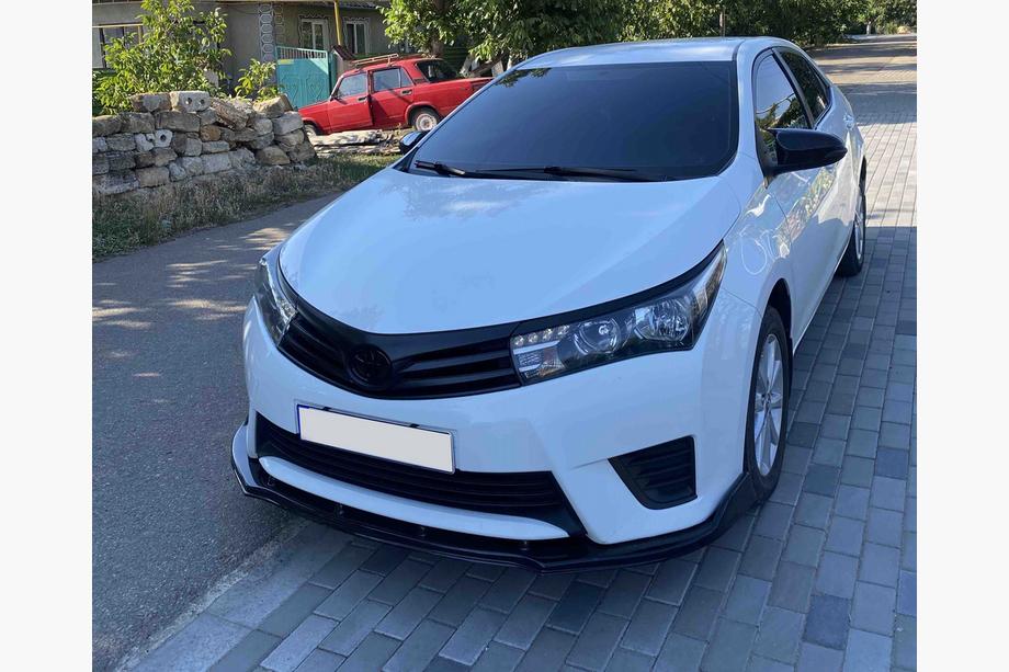 Toyota Corolla 2013–2019 Priekšējā bufera lūpas uzlika (melna) Image
