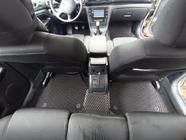 Skoda Superb 2001–2009 EVA auto paklājiņi (melni) foto 1