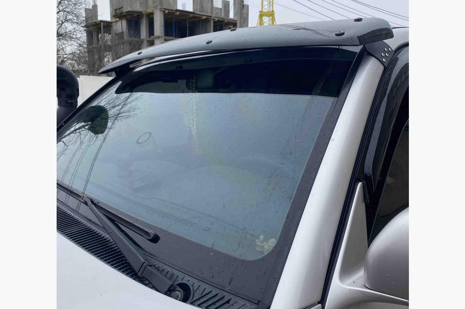Toyota Land Cruiser 100 1998–2007 Saules aizsargs vējstiklam Foto 1