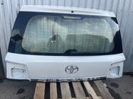 Toyota Land Cruiser 200 2007–2021 Bagāžnieka vāka augšējā daļa 2016+ balta (lietota, oriģināls) foto 2