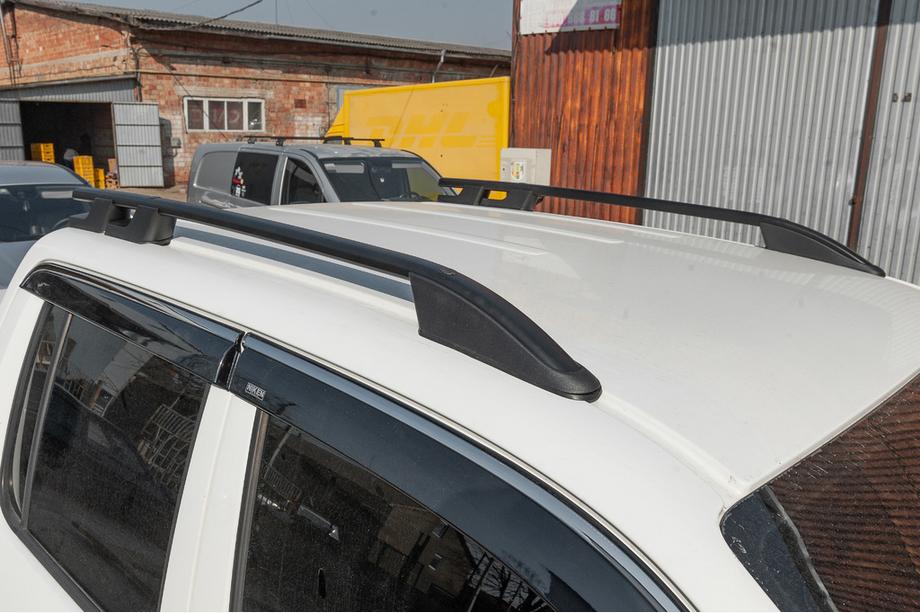Volkswagen Amarok 2010–2022 Jumta reliņi OmsaLine Sport (2 gab., melni) Foto 1