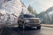 Liels astoņvietīgs apvidus auto Chevrolet Suburban foto 2