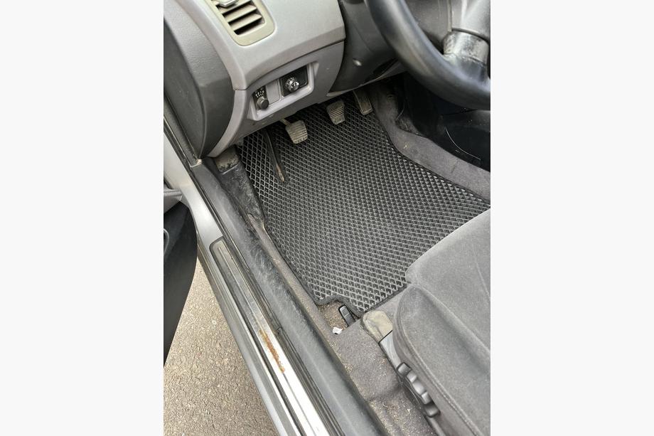Nissan Primera P12 2002–2007 EVA auto paklājiņi (melni) Image