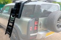 Land Rover Defender 2019– Sānu kāpšļi foto 1
