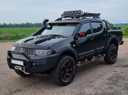Mitsubishi L200 2006–2015 Grozs Dakar rollbāram (100x100 cm) foto 12