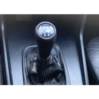 Pārnesumu pārslēga rokturis V2 5-pakāpju (mākslīgā āda, melns gluds) BMW 5. sērija E34 1988–1995 foto 1