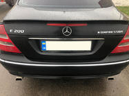 Mercedes E-сlass W211 2002–2009 Aizmugures emblēma foto 2