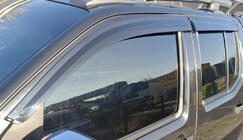 Nissan Navara 2006–2015 Logu vēja deflektori (4 gab., Sunplex Sport) foto 1