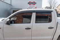 Volkswagen Amarok 2010–2022 Logu vēja deflektori (4 gab., Sunplex Sport) foto 2