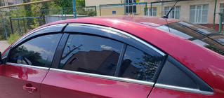 Chevrolet Cruze 2009–2015 Logu vēja deflektori ar hromētu moldingu (4 gab., Sunplex Chrome) foto 2