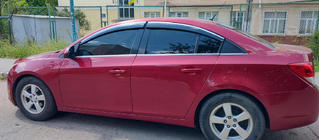 Chevrolet Cruze 2009–2015 Logu vēja deflektori ar hromētu moldingu (4 gab., Sunplex Chrome) foto 1
