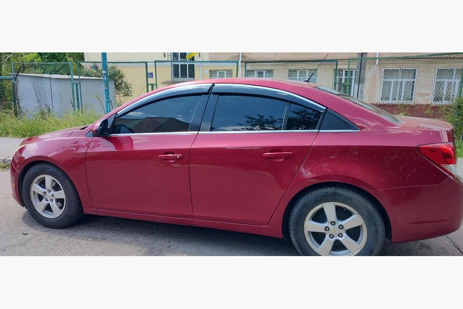 Chevrolet Cruze 2009–2015 Logu vēja deflektori ar hromētu moldingu (4 gab., Sunplex Chrome) Image