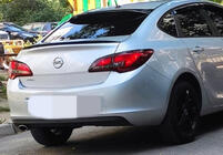 Opel Astra J 2009–2015 Sedan LIP spoileris (Sunplex, melns) (115 cm x 5,5 cm) foto 1