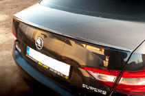 Skoda Superb 2015–2024 LIP spoilers (Sunplex, melns) (119,2 cm x 7,3 cm) foto 1