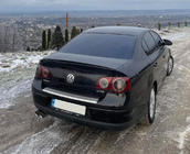 Volkswagen Passat B6 2006–2012 LIP spoileris (Sunplex, melns) (115,8 cm x 6,3 cm) foto 1