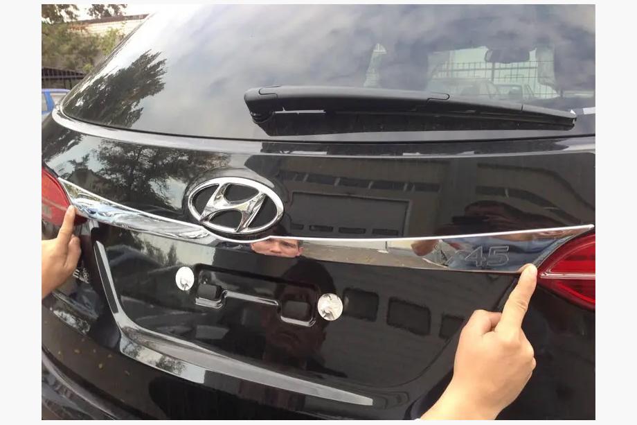Hyundai Santa Fe 3 2012–2018 Hromēta līste virs numura zīmes Image